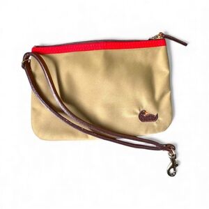 Dooney & bourke tan clutch for inside purse. NWOT